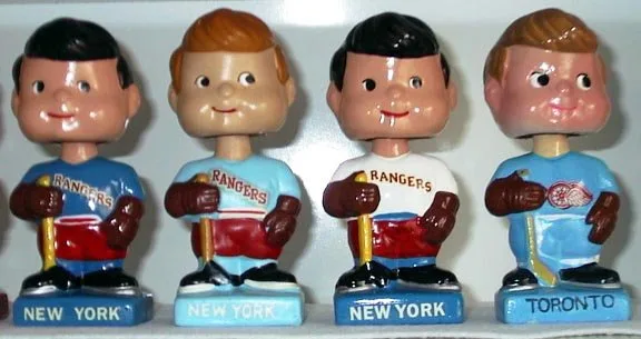 Original and repainted New York Rangers Mini dolls